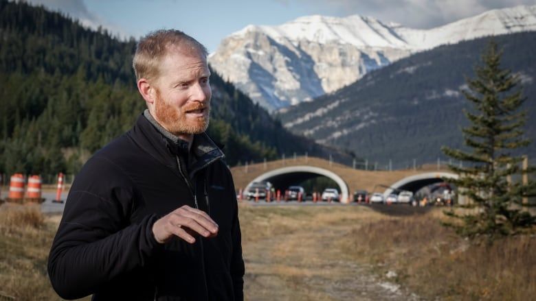 Tim Johnson, a landscape connectivity specialist with the Yellowstone to Yukon Conservation Initiative, speaks about the organization's wildlife overpass over the Trans Canada highway near Exshaw, Alta.